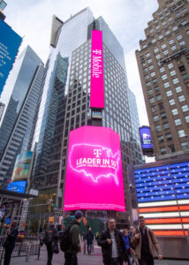 Midtown Financial digital billboard in New York City with T-Mobile ad